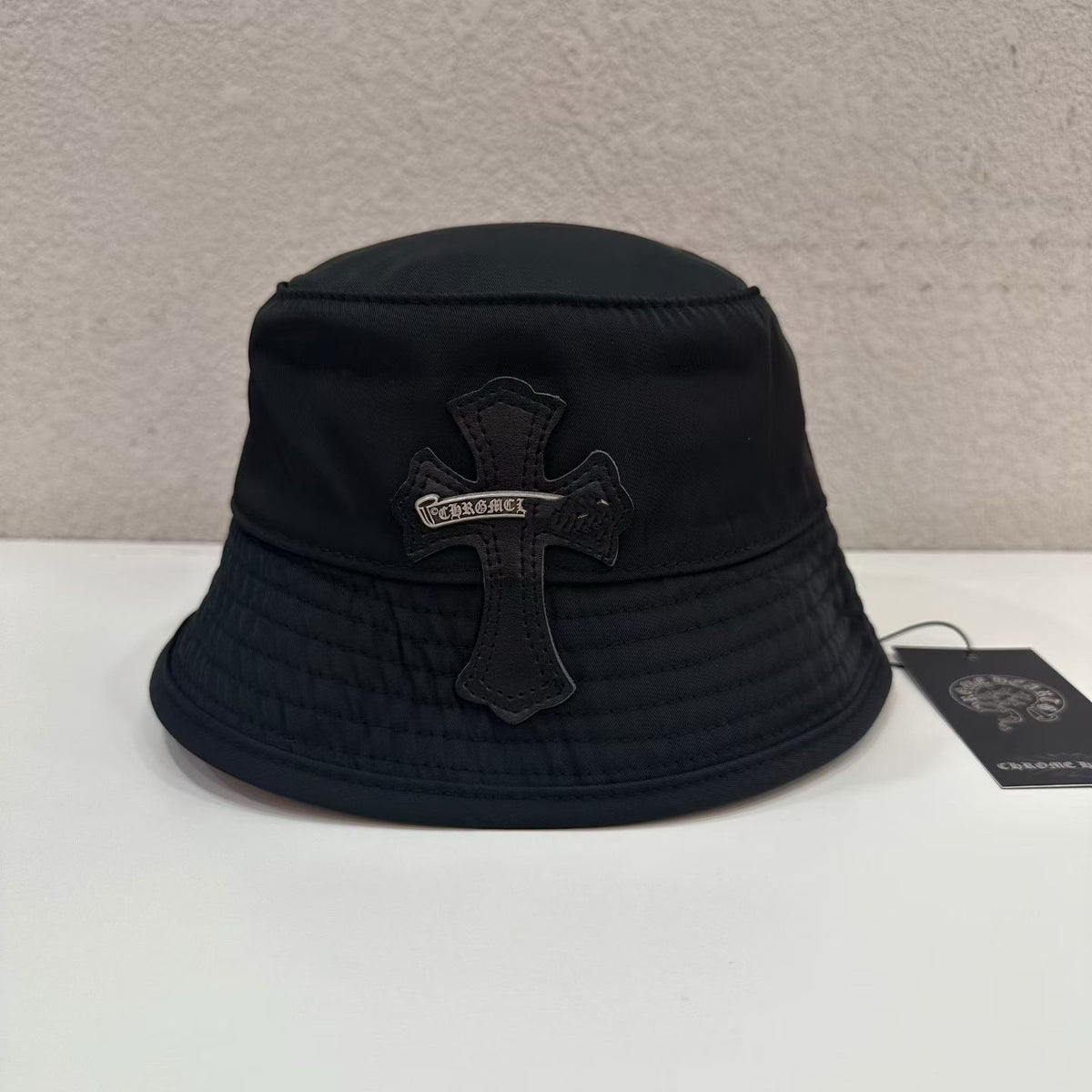 Authentic Chrome Hearts Chrome Hearts Black Bucket Hat with Silver Bar Cross Patch – front view