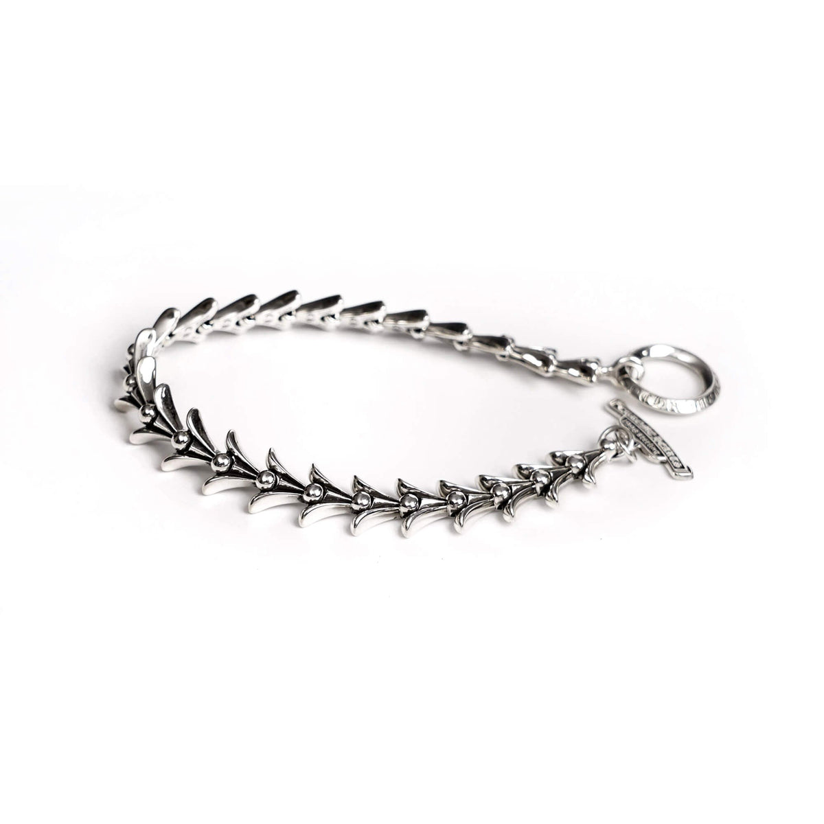 Chrome Hearts Crosstail Bracelet With Logo Tag – bracelet front view